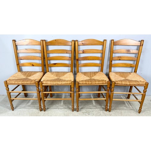 545 - FOUR MODERN RUSH SEAT LADDER BACK CHAIRS