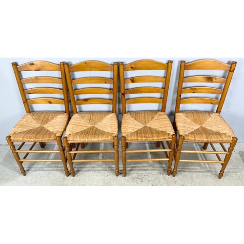 545 - FOUR MODERN RUSH SEAT LADDER BACK CHAIRS