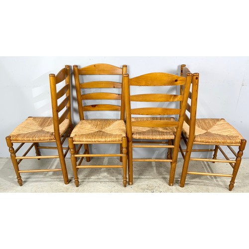 545 - FOUR MODERN RUSH SEAT LADDER BACK CHAIRS