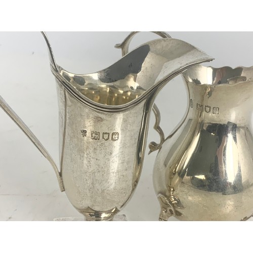 335 - TWO SILVER CREAM JUGS 147g