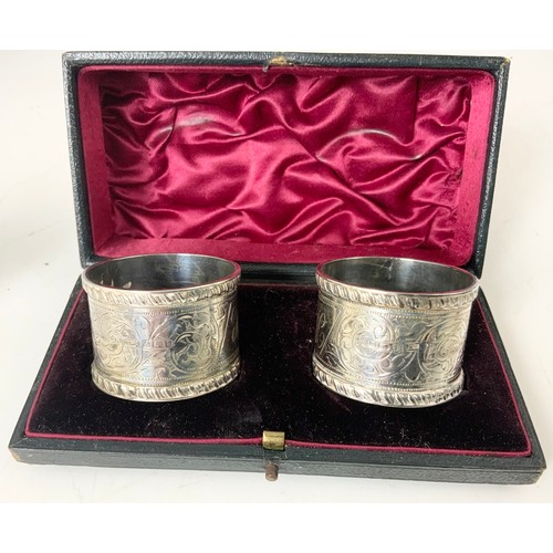 145 - PR. GOOD QUALITY SILVER SERVIETTE RINGS IN A PRESENTATION CASE, APPROX. 60g AND A 3 PIECE SILVER CRU... 