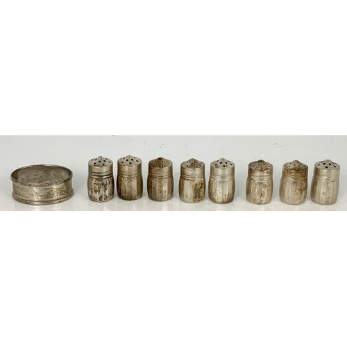 148 - SET OF 8 PEPPERS MARKED STERLING AND A SILVER SERVIETTE RING