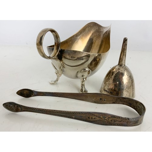 176 - HALLMARKED SILVER SAUCE BOAT ON 3 HOOF FEET, SMALL SILVER WINE FUNNEL AND A PAIR OF SILVER SUGAR TON... 