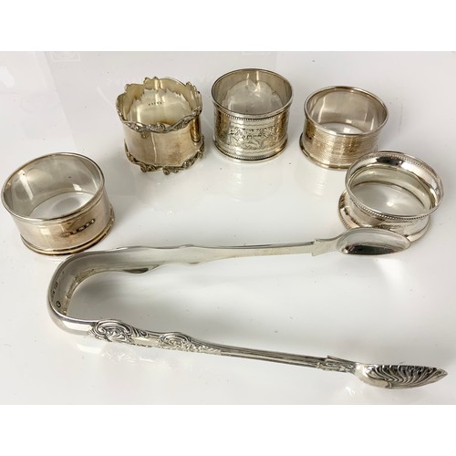 159 - 5 SILVER NAPKIN RINGS AND  RARE GLASGOW  1865 SILVER SUGAR TONGS 159g