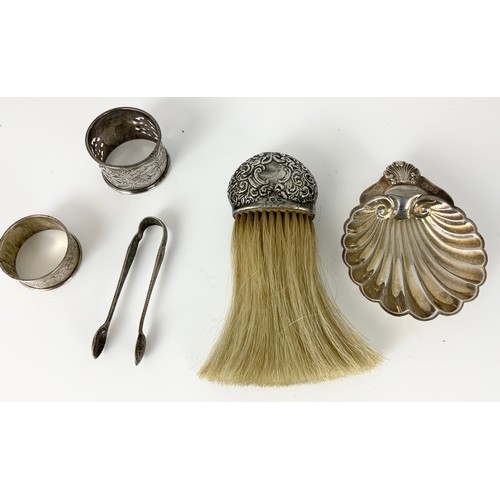 155 - MISC. SILVER TO INC. SCALLOP DISH, 2 SERVIETTE RINGS AND TONGS, APPROX. 104g TOGETHER WITH A SILVER ... 