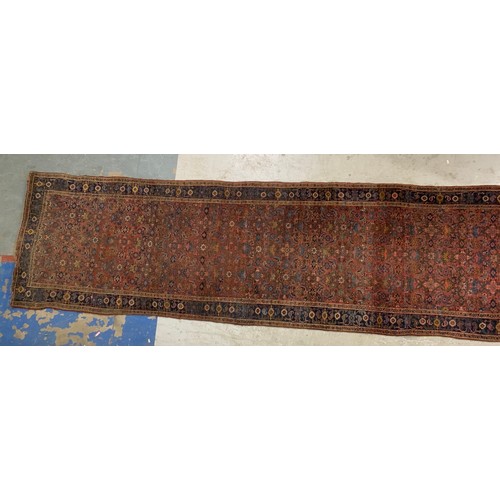 685 - HUGE RED GROUND RUNNER 538cm x106cm