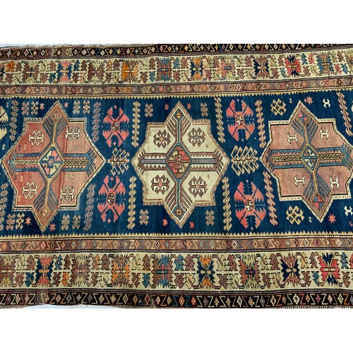 689 - BLUE  & BEIGE GROUND RUG WITH GEOMETRIC PATTERN 280cm x 160cm