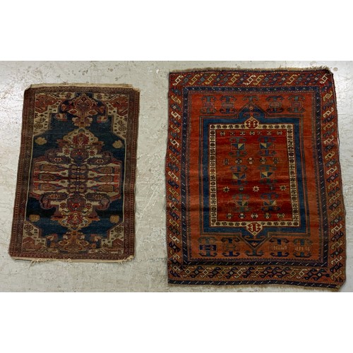 701 - 2 RED & BLUE GROUND RUGS LARGEST 173cm x 136cm