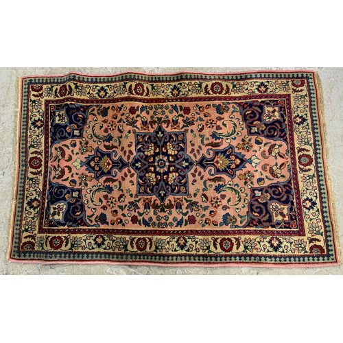 697 - 2 BLUE GROUND RUGS LARGEST 150cm x 125cm