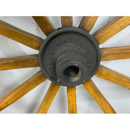 493 - PAIR OF MASSEY HARRIS TORONTO WAGON WHEELS WITH METAL RIMS 112cm DIAMETER