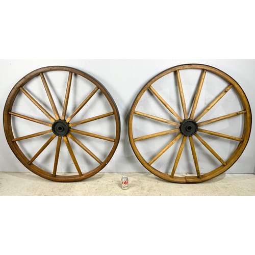 493 - PAIR OF MASSEY HARRIS TORONTO WAGON WHEELS WITH METAL RIMS 112cm DIAMETER