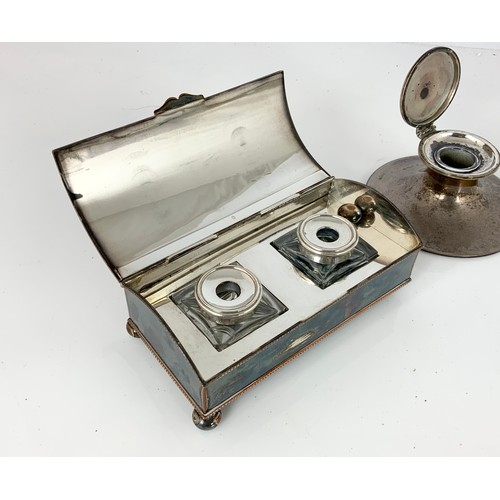 306 - SILVER CAPSTAN INK WELL AND A  SILVER PLATED DESK INKWELL