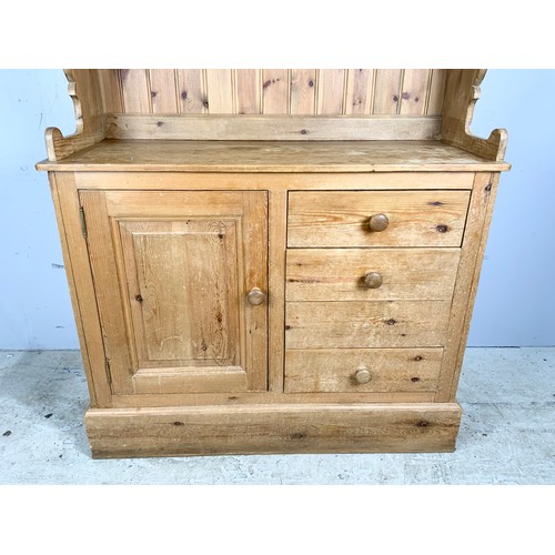 554 - PINE KITCHEN DRESSER WITH CUPBOARD ABOVE WIDTH 110cm . 201cm TALL