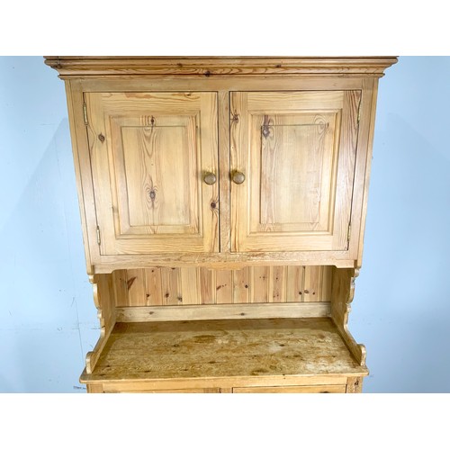 554 - PINE KITCHEN DRESSER WITH CUPBOARD ABOVE WIDTH 110cm . 201cm TALL