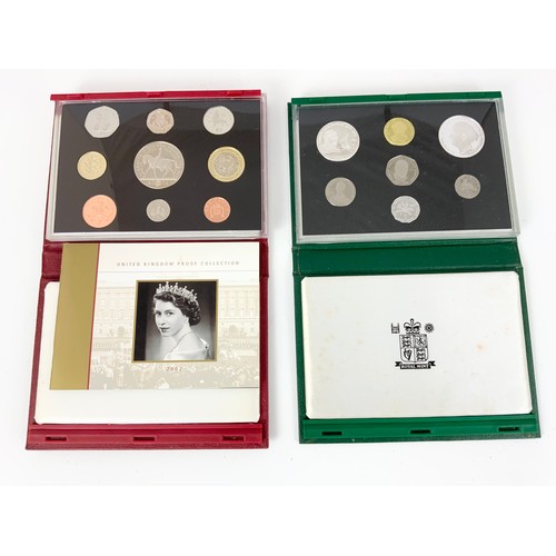 374 - ROYAL MINT DELUXE PROOF COIN SETS, 1997, 2001 AND 2002 AND A JAMAICAN 1994 PROOF SET