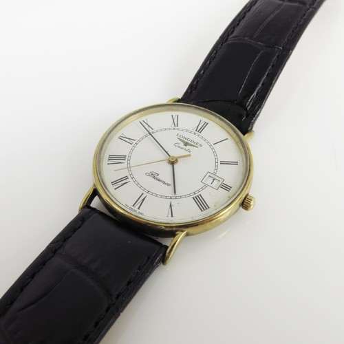 484 - A LATE 20TH CENTURY 9CT GOLD QUARTZ CALENDAR WRISTWATCH LONGINES PRESENCE WITH CENTRE SECONDS