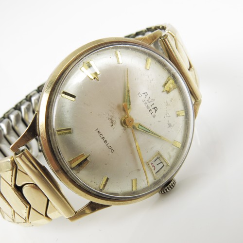 483 - A GENTS VINTAGE 9CT GOLD CASED AVIA MANUAL WIND DATE WATCH WITH FLEXI STRAP