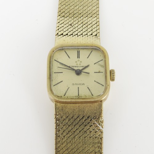 447 - LADIES ETERNA-MATIC SAHIDA, 9CT GOLD CASED ON A GOLD MESH STRAP WRIST WATCH