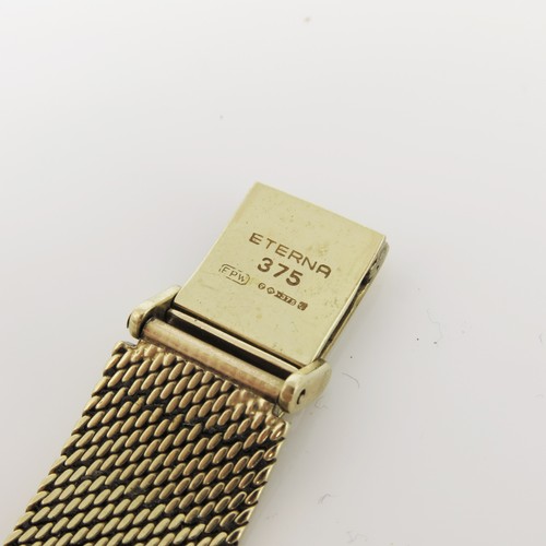 447 - LADIES ETERNA-MATIC SAHIDA, 9CT GOLD CASED ON A GOLD MESH STRAP WRIST WATCH