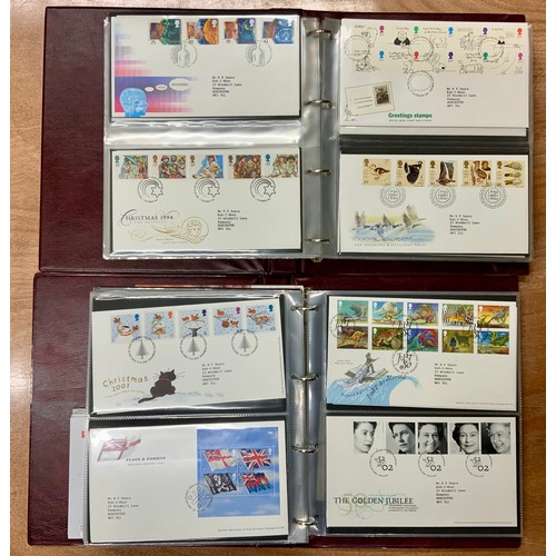 485 - TWO ROYAL MAIL FIRST DAY COVER ALBUMS, WITH A SELECTION OF FIRST DAY COVERS