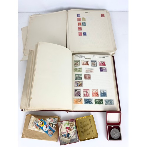 533 - 2 ALBUMS ALL WORLD STAMPS