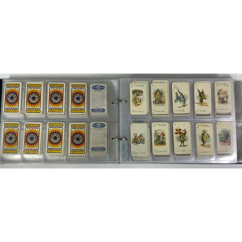 465 - A NOSTALGIA CIGARETTE CARD ALBUM, CONTAINING CIGARETTE CARDS FROM SEVERAL MANUFACTURERS INC. MITCHEL... 