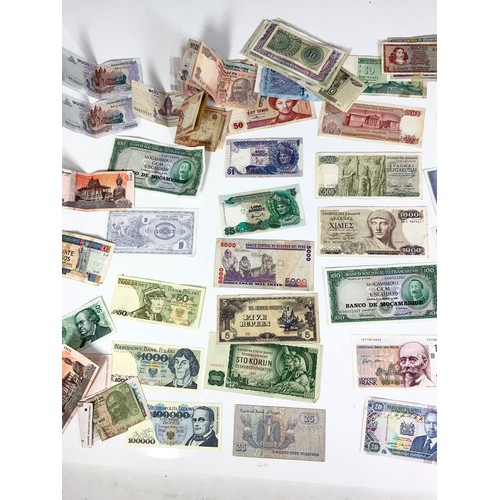 383 - LARGE QUANTITY OF MIXED NATIONALITY BANKNOTES