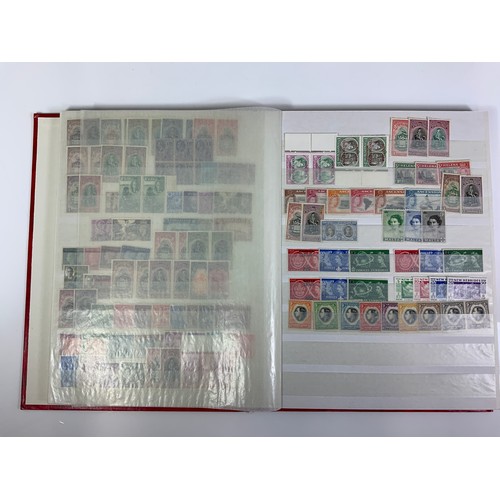 511 - STAMP INTEREST, RED STOCKBOOKS CONTAINING A MINT AND USED RANGE OF COMMONWEALTH, STAMPS INCLUDING SE... 