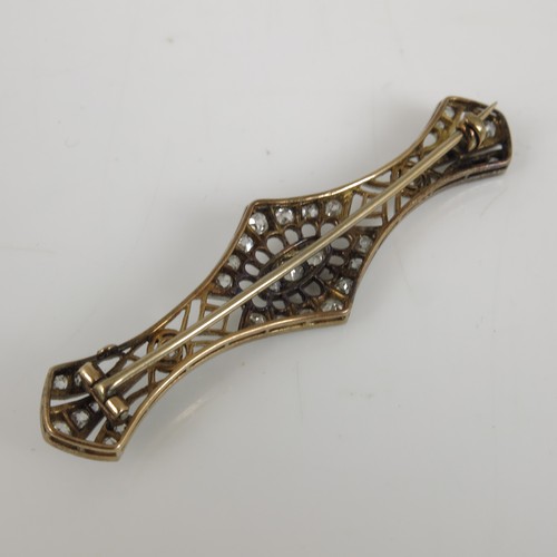 687 - LOVELY DIAMOND SET ART DECO BROOCH IN THE FORM OF AN ELONGATED BOW, APPROX. 6.5 cm