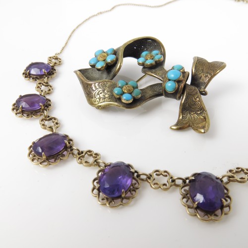 547 - PRETTY AMETHYST NECKLACE AND A TURQUOISE SET BROOCH