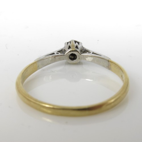 674 - 18CT GOLD AND PLATINUM SOLITAIRE DIAMOND RING