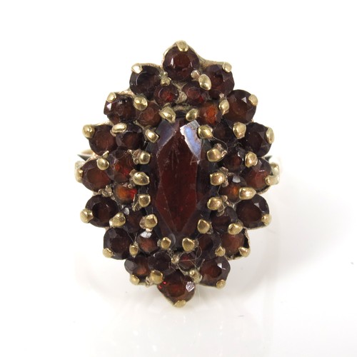 634 - 9CT GOLD GARNET CLUSTER RING