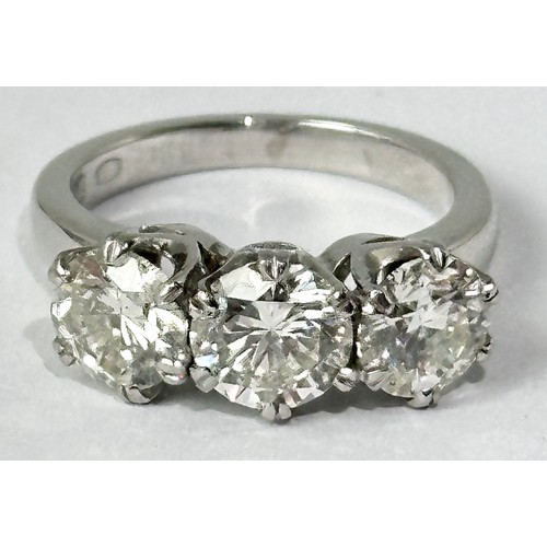 692 - 3 STONE DIAMOND RING, APPROX. 3CTS ON A PLATINUM BAND