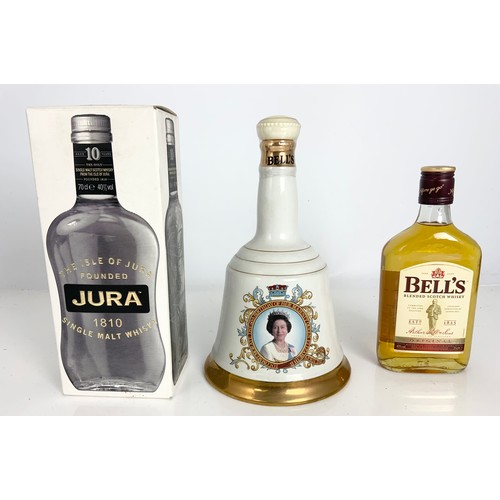 15 - WHISKY, BOTTLE JURA 10 YEAR OLD SINGLE MALT, BELLS COMMEMORATIVE DECANTER AND CONTENTS QUEEN’S 60TH ... 