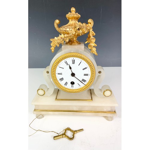 110 - A FRENCH WHITE MARBLE AND GILT BRASS MANTLE CLOCK