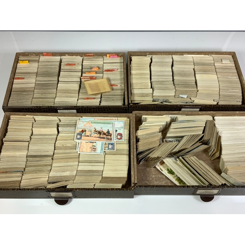 438 - STORAGE BOX WITH 4 DRAWERS FULL OF UNSORTED TRADE AND CIGARETTE CARDS