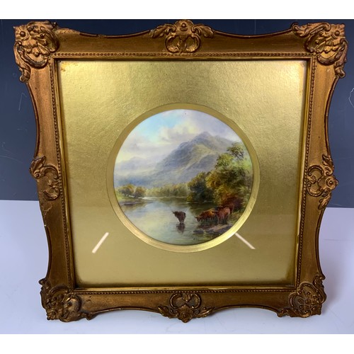 31 - FRAMED ROYAL WORCESTER CIRCULAR PLAQUE HAND DECORATED WITH HIGHLAND CATTLE IN A NATURAL LANDSCAPE SI... 