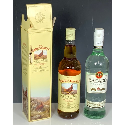 28 - A BOTTLE OF  FAMOUS GROUSE WHISKY & A BOTTLE OF BACARDI SUPERIOR, TOGETHER WITH A 4.5 LITRE BOTTLE O... 