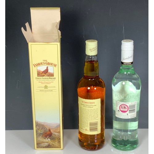 28 - A BOTTLE OF  FAMOUS GROUSE WHISKY & A BOTTLE OF BACARDI SUPERIOR, TOGETHER WITH A 4.5 LITRE BOTTLE O... 