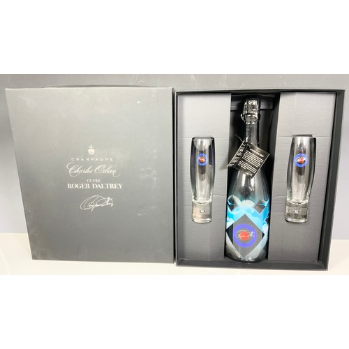 70 - ROGER DALTREY PRESENTATION BOX CONTAINING ONE BOTTLE OF CUVÉE ROGER DALTREY CHAMPAGNE AND TWO STEM-L... 