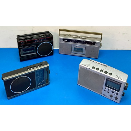 202 - FOUR PORTABLE RADIO CASSETTE PLAYER INC. ROBERTS, GRUNDIG, HITACHI AND BUSH. NOTE: Listing updated