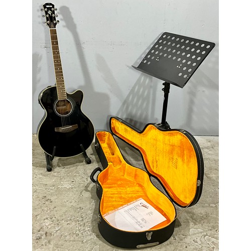 220 - CASED YAMAHA CPX700 ELECTRO ACCOUSTIC GUITAR, MUSIC STAND AND GUITAR STAND