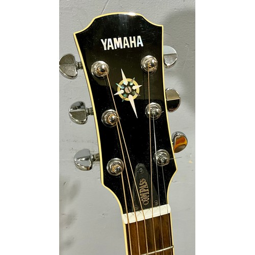 220 - CASED YAMAHA CPX700 ELECTRO ACCOUSTIC GUITAR, MUSIC STAND AND GUITAR STAND