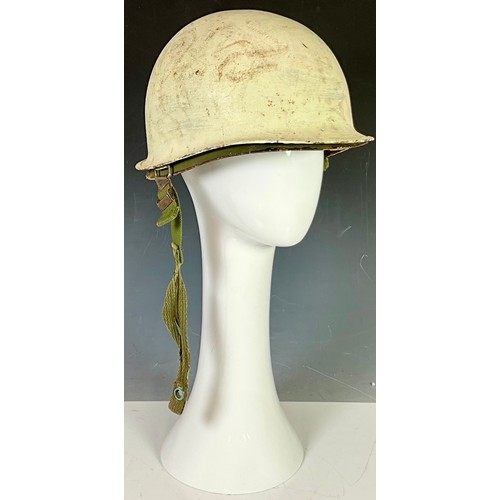 5 - US WWII TYPE MILITARY HELMET HAVING VIETNAM ERA FIBRA LINER WITH ADJUSTABLE HEADBAND DATED 74, REPAI... 