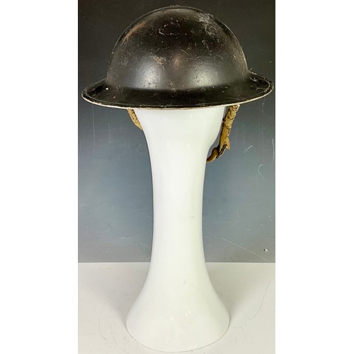 7 - A WORLD WAR II WARDEN HELMET