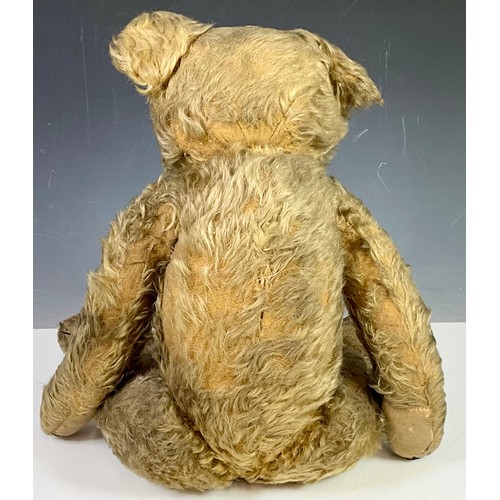 46 - A VINTAGE ‘WELL LOVED’ MERRYTHOUGHT TEDDY BEAR WITH JOINTED LEGS AND STITCHED NOSE. Approx. 67cm