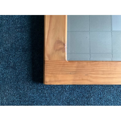 62 - WOODEN FRAMED BEVEL EDGED MIRROR. 94 x 69cm Inc. Frame