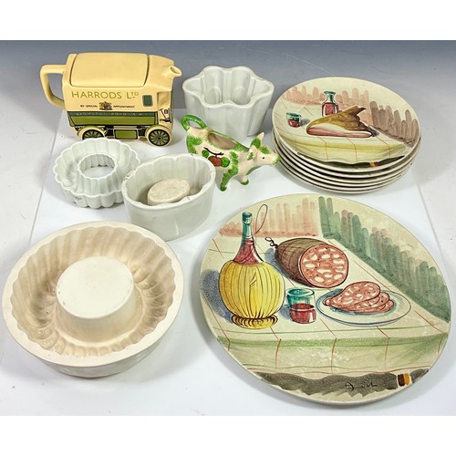 140 - MISC. JELLY MOULDS, A HARRODS TEAPOT, 6 DECORATED PLATES AND A LARGE PLATTER