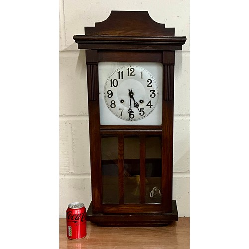 249 - OAK CASED WALL CLOCK WITH PENDULUM AND KEY