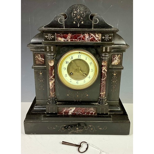 252 - VICTORIAN BLACK SLATE AND RED MARBLE MANTLE CLOCK WITH KEY